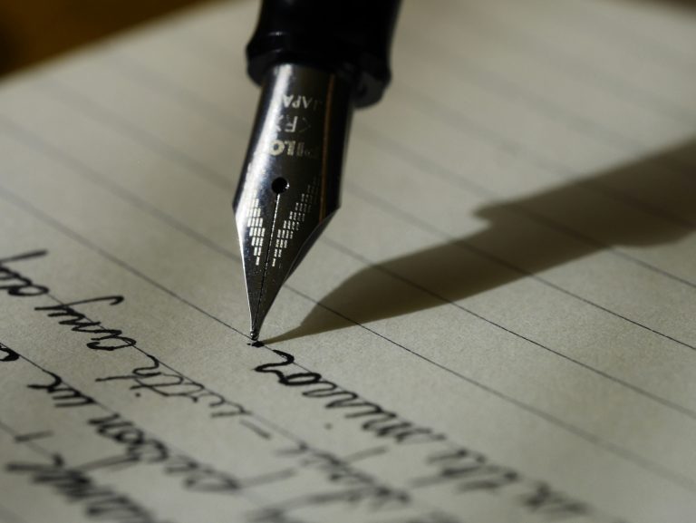 fountain pen writing on a paper